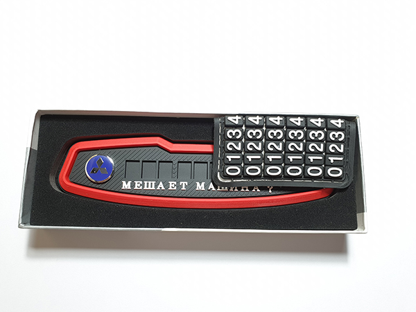 Табличка резиновая с номером телефона на парприз MITSUBISHI красная  11859